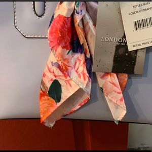 Purse with handle and long shoulders strap